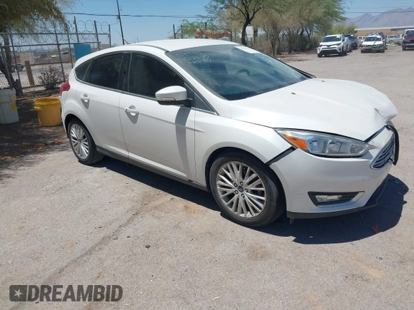 2016 Ford Focus Titanium with VIN 1FADP3N27GL319497, listed as a IAAI auction lot 42385359 with Not provided miles and . Bid and sale history available at DreamBid. Image 1.