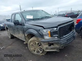 2019 Ford F-150 XL with VIN 1FTFX1E52KKE30877, listed as a IAAI auction lot 42196829 with 105,278 mi miles and . Bid and sale history available at DreamBid. Image 1.