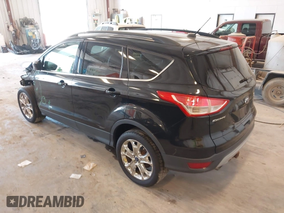 2014 Ford Escape SE with VIN 1FMCU9G95EUA16328, listed as a IAAI auction lot 42464235 with 108,570 mi miles and . Bid and sale history available at DreamBid. Image 3.