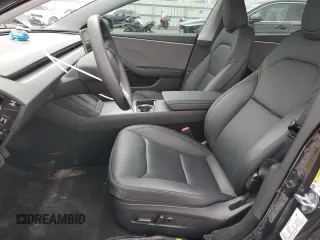 2025 Tesla Model 3 Long Range with VIN 5YJ3E1EA5SF889727, listed as a Copart auction lot 49207545 with 6,980 mi miles and Salvage Title. Bid and sale history available at carsss.com. Image 7.