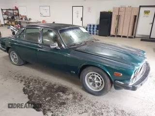 1985 Jaguar XJ with VIN SAJAV1347FC414864, listed as a IAAI auction lot 42118511 with 117,185 mi miles and . Bid and sale history available at DreamBid. Image 1.