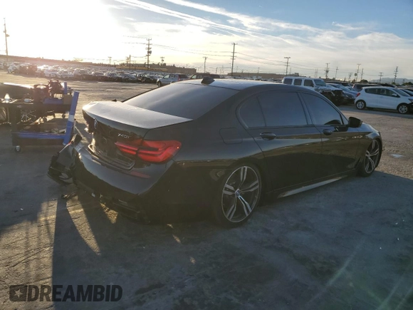 2017 BMW 7 Series 740i with VIN WBA7E2C38HG741255, listed as a Copart auction lot 39926213 with 76,321 mi miles. Bid and sale history available at carsss.com. Image 3.