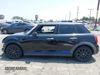 2015 MINI Hardtop 4 Door S z VIN WMWXU3C58F2B66601, wystawiony jako IAAI lot #42444404 z przebiegiem 76 174 mil mil oraz . Historia ofert i sprzedaży dostępna na DreamBid. Obrazek 15.