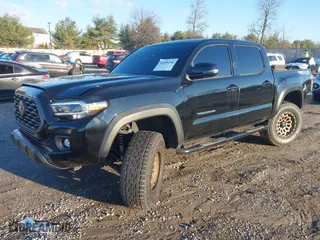 2022 Toyota Tacoma 4WD SR with VIN 3TMCZ5AN1NM479690, listed as a IAAI auction lot 41090208 with 26,481 mi miles. Bid and sale history available at carsss.com. Image 17.