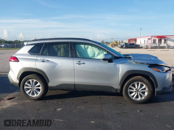 2023 Toyota Corolla Cross LE with VIN 7MUCAAAG0PV037445, listed as a IAAI auction lot 42686510 with 18,282 mi miles and . Bid and sale history available at DreamBid. Image 14.