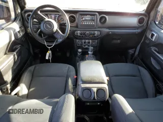 2020 Jeep Wrangler Unlimited Willys with VIN 1C4HJXDG5LW348507, listed as a Copart auction lot 77000574 with 57,056 mi miles and Salvage title. Bid and sale history available at DreamBid. Image 8.