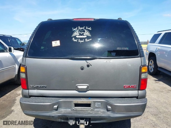 2005 GMC Yukon Denali with VIN 1GKEK63U35J149963, listed as a IAAI auction lot 41829530 with 243,575 mi miles. Bid and sale history available at carsss.com. Image 16.