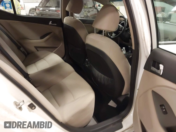 2014 Kia Optima LX with VIN KNAGM4AD2E5076063, listed as a IAAI auction lot 42014109 with 159,450 mi miles and . Bid and sale history available at DreamBid. Image 8.