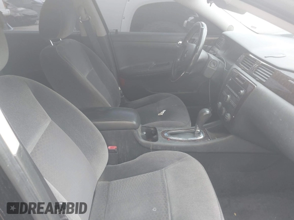 2013 Chevrolet Impala LS with VIN 2G1WF5E39D1109102, listed as a IAAI auction lot 42010215 with 108,480 mi miles and . Bid and sale history available at DreamBid. Image 5.