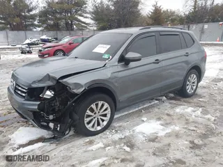 2018 Volkswagen Tiguan S with VIN 3VV0B7AX1JM143571, listed as a IAAI auction lot 41555436 with 72,545 mi miles. Bid and sale history available at carsss.com. Image 17.