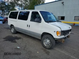 2002 Ford Econoline Passenger XL with VIN 1FMRE11WX2HA57114, listed as a Copart auction lot 68766174 with 167,382 mi miles and Salvage Title. Bid and sale history available at DreamBid. Image 4.