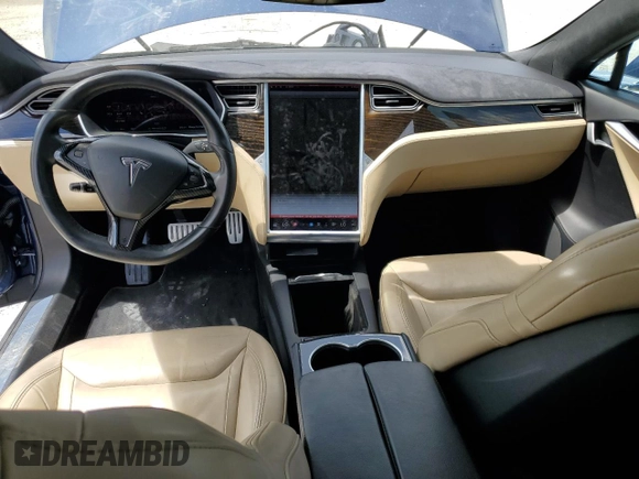 2016 Tesla Model S 90D z VIN 5YJSA1E20GF160834, wystawiony jako Copart lot #61898505 z przebiegiem 131 153 mil mil oraz Szkoda całkowita • Salvage title. Historia ofert i sprzedaży dostępna na DreamBid. Obrazek 8.