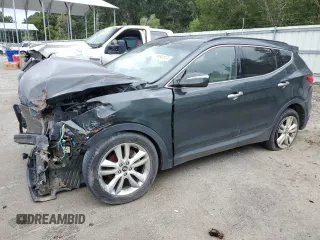 2013 Hyundai Santa Fe Sport z VIN 5XYZUDLAXDG082486, wystawiony jako Copart lot #68941974 z przebiegiem Nie podano mil oraz Szkoda całkowita • Salvage title. Historia ofert i sprzedaży dostępna na DreamBid. Obrazek 1.