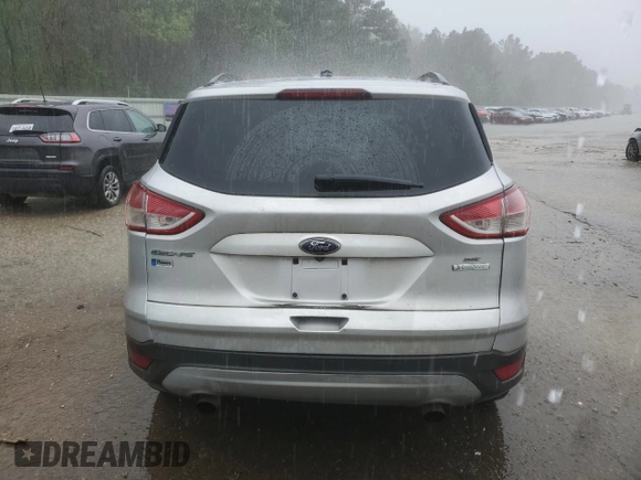 2014 Ford Escape SE with VIN 1FMCU0G90EUC27903, listed as a Copart auction lot 51216885 with 133,948 mi miles and Salvage Title. Bid and sale history available at carsss.com. Image 6.