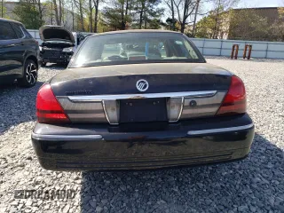 2010 Mercury Grand Marquis LS z VIN 2MEBM7FV8AX618001, wystawiony jako Copart lot #55382305 z przebiegiem 209 814 mil mil oraz Tytuł czysty. Historia ofert i sprzedaży dostępna na DreamBid. Obrazek 6.