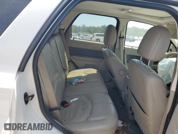 2010 Mercury Mariner Premier with VIN 4M2CN8H70AKJ17236, listed as a Copart auction lot 54974705 with Not provided miles and Salvage title. Bid and sale history available at DreamBid. Image 11.