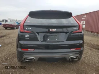 2022 Cadillac XT4 AWD Premium Luxury z VIN 1GYFZDR43NF132553, wystawiony jako Copart lot #50869955 z przebiegiem 25 412 mil mil oraz Szkody całkowita. Historia ofert i sprzedaży dostępna na DreamBid. Obrazek 6.