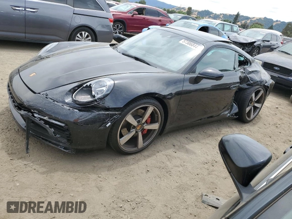 2024 Porsche 911 Carrera S with VIN WP0AB2A92RS218949, listed as a Copart auction lot 57306844 with 1,296 mi miles and Salvage Title. Bid and sale history available at carsss.com. Image 1.