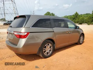 2013 Honda Odyssey EX-L with VIN 5FNRL5H68DB075153, listed as a Copart auction lot 60887325 with 263,001 mi miles and Salvage title. Bid and sale history available at DreamBid. Image 3.