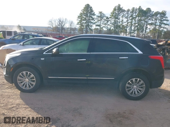 2019 Cadillac XT5 Luxury FWD z VIN 1GYKNCRSXKZ102866, wystawiony jako IAAI lot #41335840 z przebiegiem 59 563 mil mil oraz . Historia ofert i sprzedaży dostępna na DreamBid. Obrazek 14.