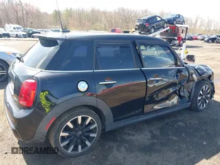 2017 MINI Hardtop 4 Door Cooper S z VIN WMWXU3C39H2F48699, wystawiony jako IAAI lot #41924423 z przebiegiem 81 249 mil mil oraz . Historia ofert i sprzedaży dostępna na DreamBid. Obrazek 18.