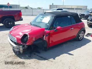 2006 MINI Convertible with VIN WMWRF33556TG14466, listed as a IAAI auction lot 42096368 with 120,230 mi miles and . Bid and sale history available at DreamBid. Image 18.