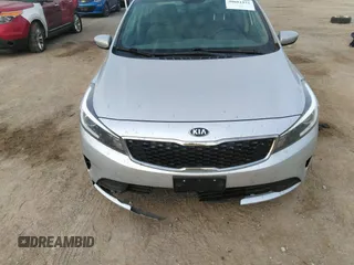 2018 Kia Forte LX with VIN 3KPFK4A79JE210080, listed as a IAAI auction lot 40681931 with 124,986 mi miles and . Bid and sale history available at DreamBid. Image 6.