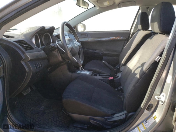 2015 Mitsubishi Lancer ES with VIN JA32U2FU5FU009232, listed as a Copart auction lot 53818605 with 139,296 mi miles and Salvage Title. Bid and sale history available at carsss.com. Image 7.