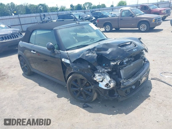 2013 MINI Convertible S with VIN WMWZP3C59DT550746, listed as a IAAI auction lot 39538986 with 59,934 mi miles and . Bid and sale history available at DreamBid. Image 1.