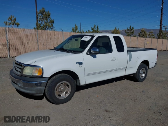 2002 Ford F-150 XL with VIN 1FTRX17W22KE34494, listed as a IAAI auction lot 41689313 with 250,243 mi miles. Bid and sale history available at carsss.com. Image 2.