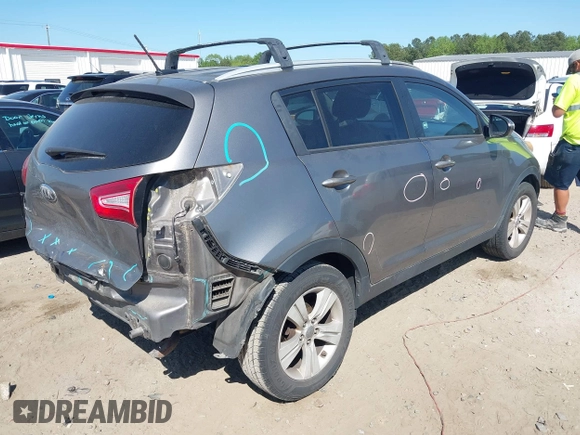 2013 Kia Sportage LX with VIN KNDPB3A21D7486860, listed as a IAAI auction lot 42049450 with 177,059 mi miles and . Bid and sale history available at DreamBid. Image 4.