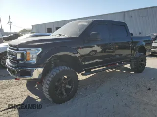2018 Ford F-150 XL with VIN 1FTEW1E50JFA63998, listed as a Copart auction lot 53326375 with 102,560 mi miles and Salvage Title. Bid and sale history available at carsss.com. Image 1.