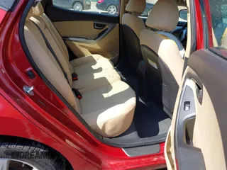 2013 Hyundai Elantra GLS z VIN 5NPDH4AE4DH405444, wystawiony jako IAAI lot #42201093 z przebiegiem 125 900 mil mil oraz . Historia ofert i sprzedaży dostępna na DreamBid. Obrazek 8.