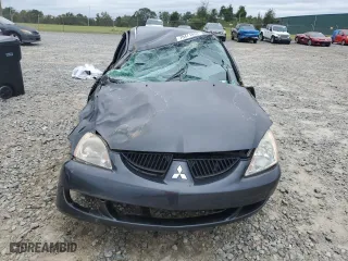 2004 Mitsubishi Lancer ES with VIN JA3AJ26EX4U043127, listed as a Copart auction lot 70471054 with 246,738 mi miles and Salvage Title. Bid and sale history available at carsss.com. Image 5.