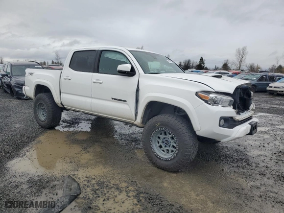 2020 Toyota Tacoma 4WD SR5 with VIN 5TFCZ5AN2LX217667, listed as a Copart auction lot 42524725 with 97,842 mi miles and Salvage Title. Bid and sale history available at carsss.com. Image 4.