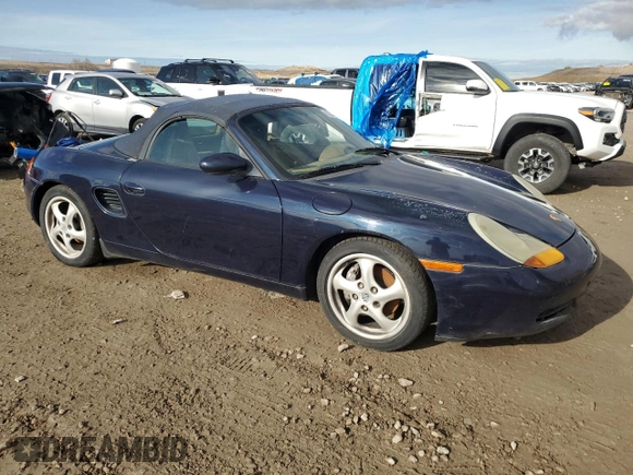 1998 Porsche Boxster z VIN WP0CA2987WU626225, wystawiony jako Copart lot #87449074 z przebiegiem 122 804 mil mil oraz Czysty tytuł • Clean title. Historia ofert i sprzedaży dostępna na DreamBid. Obrazek 4.