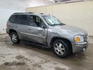 2005 GMC Envoy SLE with VIN 1GKDS13S952383743, listed as a Copart auction lot 43797315 with 185,833 mi miles and Salvage title. Bid and sale history available at DreamBid. Image 4.