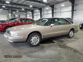 1995 Oldsmobile LSS z VIN 1G3HY5215SH307862, wystawiony jako Copart lot #69297244 z przebiegiem 129 142 mil mil oraz Szkody całkowita. Historia ofert i sprzedaży dostępna na DreamBid. Obrazek 1.