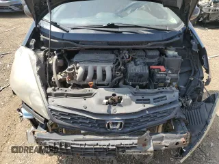 2012 Honda Fit Sport with VIN JHMGE8H55CC019255, listed as a Copart auction lot 57035445 with 193,858 mi miles and Clean Title. Bid and sale history available at DreamBid. Image 11.