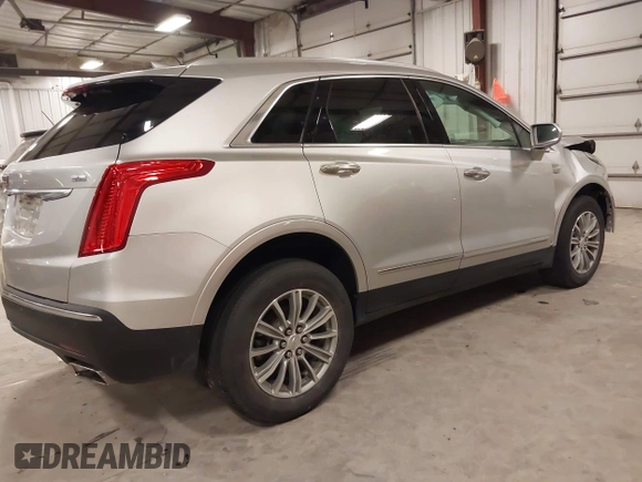 2017 Cadillac XT5 Premium Luxury AWD with VIN 1GYKNERS1HZ282954, listed as a IAAI auction lot 41217097 with 63,154 mi miles. Bid and sale history available at carsss.com. Image 4.