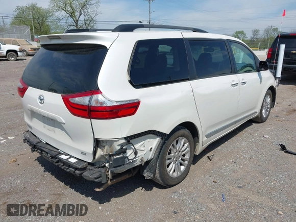 2015 Toyota Sienna XLE with VIN 5TDYK3DC8FS654902, listed as a IAAI auction lot 41953705 with 169,036 mi miles. Bid and sale history available at carsss.com. Image 4.