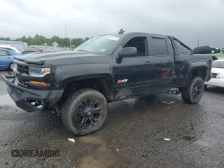 2016 Chevrolet Silverado 1500 LT with VIN 1GCVKRECXGZ383216, listed as a Copart auction lot 56497415 with 105,894 mi miles and Salvage Title. Bid and sale history available at DreamBid. Image 1.