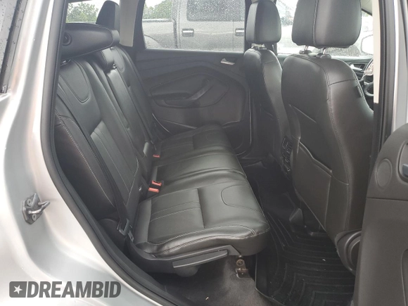 2013 Ford Escape Titanium with VIN 1FMCU9J94DUB00695, listed as a Copart auction lot 56633955 with 129,011 mi miles and Salvage title. Bid and sale history available at DreamBid. Image 11.