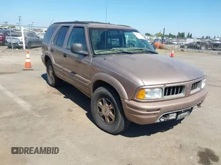 1996 Oldsmobile Bravada z VIN 1GHDT13W6T2711283, wystawiony jako IAAI lot #42539504 z przebiegiem 111 215 mil mil oraz . Historia ofert i sprzedaży dostępna na DreamBid. Obrazek 1.