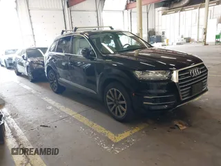 2019 Audi Q7 Premium Plus with VIN WA1LAAF73KD020866, listed as a IAAI auction lot 42283283 with 68,614 mi miles and . Bid and sale history available at DreamBid. Image 1.