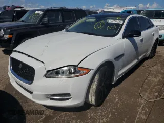 2014 Jaguar XJ with VIN SAJWA2GZ0E8V59422, listed as a Copart auction lot 74213414 with 96,314 mi miles and Non Repairable. Bid and sale history available at carsss.com. Image 1.