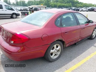 2003 Ford Taurus SE Standard с VIN 1FAFP53UX3A132852, выставлен на аукционе IAAI как лот 42477125 с пробегом 210 844 миль миль и . История ставок и продаж доступна на DreamBid. Изображение 4.