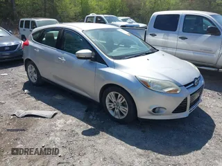 2012 Ford Focus SEL with VIN 1FAHP3M2XCL219424, listed as a IAAI auction lot 41886993 with 215,724 mi miles. Bid and sale history available at carsss.com. Image 1.