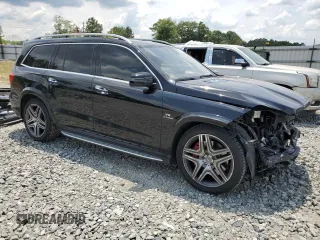 2014 Mercedes-Benz GL-Class GL 63 AMG with VIN 4JGDF7EE2EA356136, listed as a Copart auction lot 59235094 with 74,515 mi miles and Salvage Title. Bid and sale history available at carsss.com. Image 4.