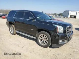 2015 GMC Yukon SLE with VIN 1GKS1AKC0FR228818, listed as a Copart auction lot 48677585 with 175,950 mi miles and Clean Title. Bid and sale history available at carsss.com. Image 4.